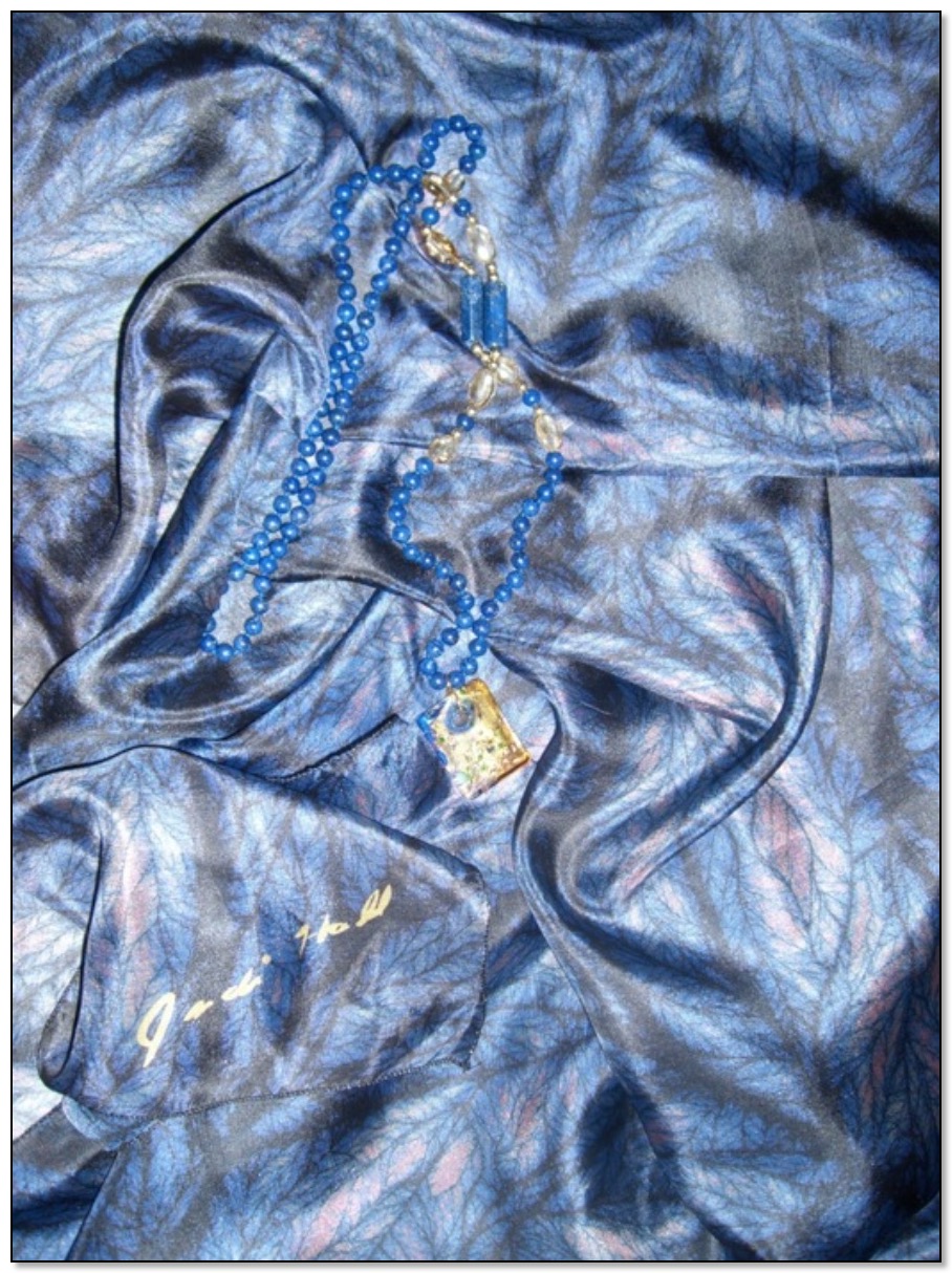 A Gingezel blue silk shawl sold at a celebrity silent auction.